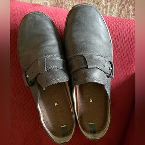 Merrell leather slides.